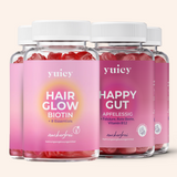 4 yuicy® Dosen im Set. Hair Glow Biotin Gummies für Haargesundheit und Happy Gut Gummies mit Apfelessig, Folsäure und Rote Beete für Stoffwechsel und Darmgesundheit.